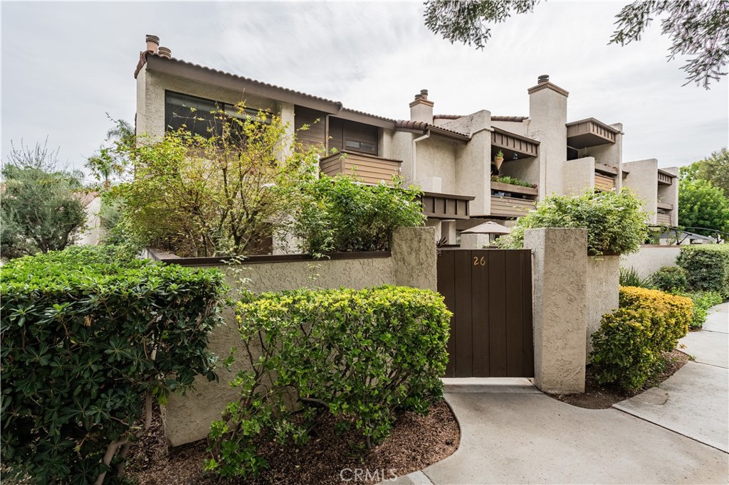 A truly rare opportunity to OWN a MOVE IN READY END UNIT in one of the most desirable communities in Warner Center! WALKING DISTANCE to Warner Center Park! Pride of ownership is evident with many thoughtful upgrades done for ease of use. This is one of very few units in the community with this 3 bedroom floor plan with less stairs. Water, trash and basic cable are included in HOA dues for added value. From the moment you enter, you will notice abundance of natural light and storage offered by this floor plan. The entertainer’s floor plan utilizes an open concept to provide both privacy and functionality. The living room, dining room, kitchen and patio are all on one level for added convenience. The sumptuous primary suite features plenty of storage space, natural light and travertine adorned fireplace making it a perfect retreat to unwind. The secondary bedrooms are generous in size. Features include: travertine flooring, new carpet, newer paint, hardwired security system ready for security service connection, recessed lighting, newer HVAC and water heater, newer washer/dryer and garage refrigerator included and private two car garage with direct access, built in storage and workbench. The private patio offers the perfect space to dine al-fresco & bask in the beautiful year-round weather that Woodland Hills has to offer.
Warner Club Villas, situated in the highly prestigious Warner Center, is a centrally located community close to everything the area has to offer. The community consists of resort-style amenities including pool and spa areas, fully lit tennis courts, lush landscaping and walking paths all while being minutes to local shopping, dining and entertainment in the heart of the San Fernando Valley. A true getaway that you can call home.
Assessor data shows property as a 2 bedroom unit, but owner converted the den into a third bedroom with permit.