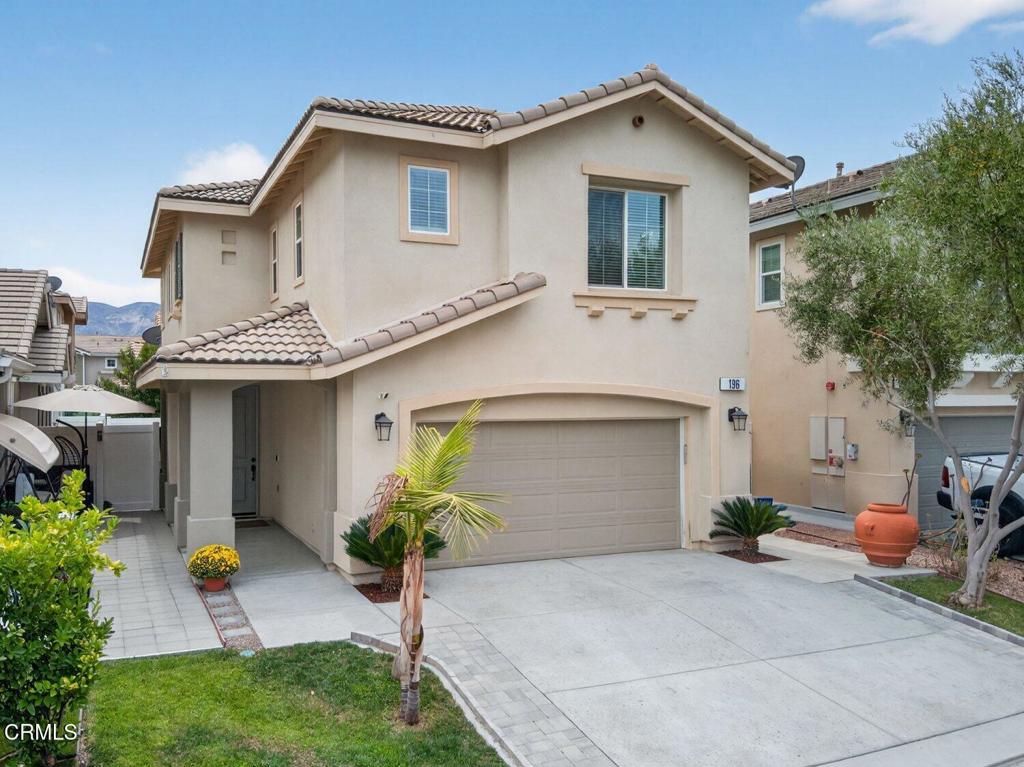 Welcome to this beautifully upgraded home in the highly desirable gated Oak Haven community of Fillmore. Offering 4 bedrooms, 2.5 bathrooms, and 1,742 sq ft of living space, this residence combines comfort, style, and functionality all in one.Inside, you will find fresh paint throughout, soaring ceilings, and recessed lighting that enhance the home's bright and airy atmosphere. The upgraded kitchen features a sleek new backsplash, while laminate flooring spans the downstairs living areas, creating a modern and cohesive look. The open layout makes this the perfect home for both everyday living and entertaining.Upstairs, the spacious primary suite offers a walk-in closet and ceiling fan for added comfort. Each bedroom is equipped with window coverings, giving the home a move-in ready feel. An individual laundry room adds convenience to the thoughtful floor plan.The backyard offers a cozy, low-maintenance outdoor space with hardscaping and a covered patio, ideal for relaxing evenings or weekend gatherings. For fitness enthusiasts, the attached garage is upgraded with a mini split system and squat rack setup, creating the perfect home gym space.Living in Oak Haven means enjoying resort-style amenities, including a community pool and spa, basketball courts, and the security of a gated neighborhood.This well-maintained property is a rare opportunity to own in one of Ventura County's most desirable communities. Do not miss your chance to call this home!