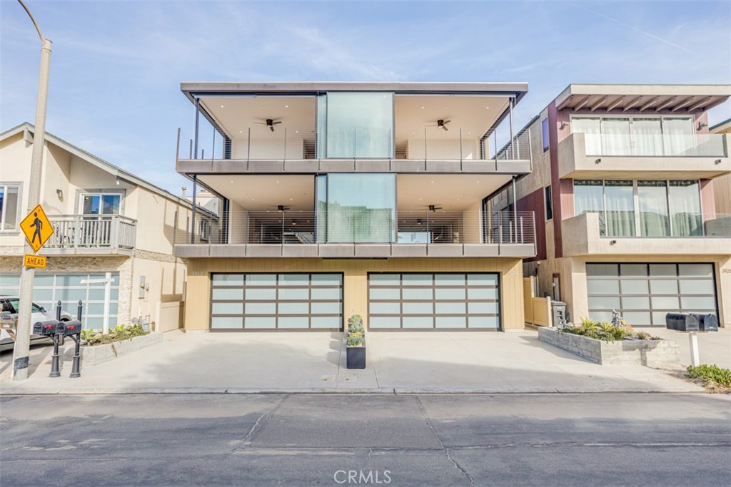 Discover modern ocean view luxury at 3928 Ocean Drive, a 4-bedroom, 3.5-bath home for lease in Oxnard, CA; nearby the sand and surf at Hollywood Beach. Offering breathtaking ocean views, this residence features floor-to-ceiling windows that open wide, creating a seamless indoor-outdoor flow. This home includes an open floor plan with dimmable recessed lighting and radiant heating throughout the home. The contemporary kitchen, open to the family room, boasts quartz counters, stainless steel appliances and a large island; perfect for entertaining. The primary bathroom provides a spa-like experience with double sinks, quartz countertops, and an expansive walk-in shower and soaking tub experience. The ground floor bedroom includes a separate entrance, kitchenette, bathroom, closet and ventless washer/dryer unit. Relax on the ocean-view balconies and utilize the installed elevator for accessibility on all floors. Added amenities include a ring doorbell for security, solar power for efficiency, washer, dryer, an attached 2-car garage with storage and space in the driveway for 2 additional parking spots. Experience sophisticated seaside living combining comfort, convenience and coastal charm.