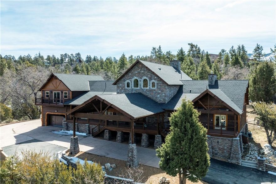 A luxurious 5-bedroom, 6-bath custom mountain estate located in the gated Fox Farm area. Built in 2007, the home spans nearly 5,000 sq ft on a private 1.87-acre lot. Grand entry with soaring wood-beamed cathedral ceilings and slate floor. Open floorplan with multiple living areas, including a family room, formal living, loft/game room with wet bar. Gourmet kitchen: warm wood cabinetry, stainless appliances, granite countertops, breakfast bar, and walk-in pantry. Wine room: temperature-controlled, adjacent to kitchen. Fireplaces (3 total): located in living room, family room, and the master suite, all adorned with stacked-stone finishes. Composite decks at both front and back, accessible from all bedrooms, offering serene forest and mountain views. Large covered front porch and a matching rear deck for entertaining. Four-car attached garage + porte cochère & driveway with gated private drive. Bonus office/nursery off the primary suite, complete with custom dog-run. Temperature-controlled wine room & walk-in pantry for storage convenience. HVAC with central air, whole house humidifier, forced-air heating. Luxury finishes: beamed ceilings, slate/tile/wood flooring, double-pane windows, wet bar. Security system owned. Captivating views of surrounding mountains and forest from multiple vantage points
Located in Big Bear’s central Fox Farm area, just minutes from ski slopes, the lake, hiking, and local amenities. Gated entry with private road leading up to property. Offered fully furnished.
ZONED SAN BERNARDINO COUNTY - ALMOST 2 ACRES - CAN BUILD ADU - CONTACT COUNTY FOR DETAILS.