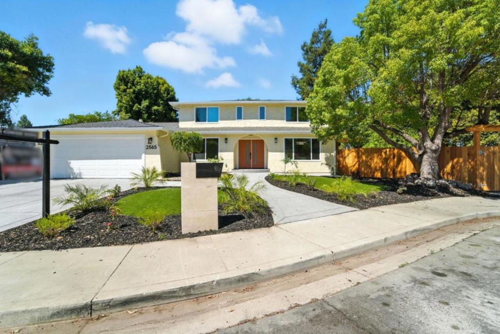 Discover the perfect residence in Santa Clara, offering spacious living with 2,449 sqft on a generous 9,506 sqft lot. This home features 5 bedrooms & 3 bathrooms. Ground floor has 1 bedroom & 1 full bathroom. All 3 bathrooms feature floor-to-ceiling porcelain tiles, luxury amenities from Porcelanosa, stall showers, and showers over tubs. The kitchen is a culinary delight, equipped with quartz countertops, a dishwasher, garbage disposal, hood over range, an electric oven range, and refrigerator. Enjoy meals in the dining area or the eat-in kitchen, which seamlessly connects to the family room with vaulted ceiling. Backyard has serene landscaping along with a working fountain and waterfall feature. Experience comfort with central HVAC, and enjoy the ambiance of a cozy fireplace. The home has energy-efficient features such as ceiling insulation, double-pane windows, Energy Star appliances, and LED lighting. Laundry is a breeze with a utility room featuring electricity and gas hookups, a tub/sink, and a washer/dryer. Additional highlights include a 2-car garage with Level 2 EV hookup, and location within the Campbell Union Elementary School District.