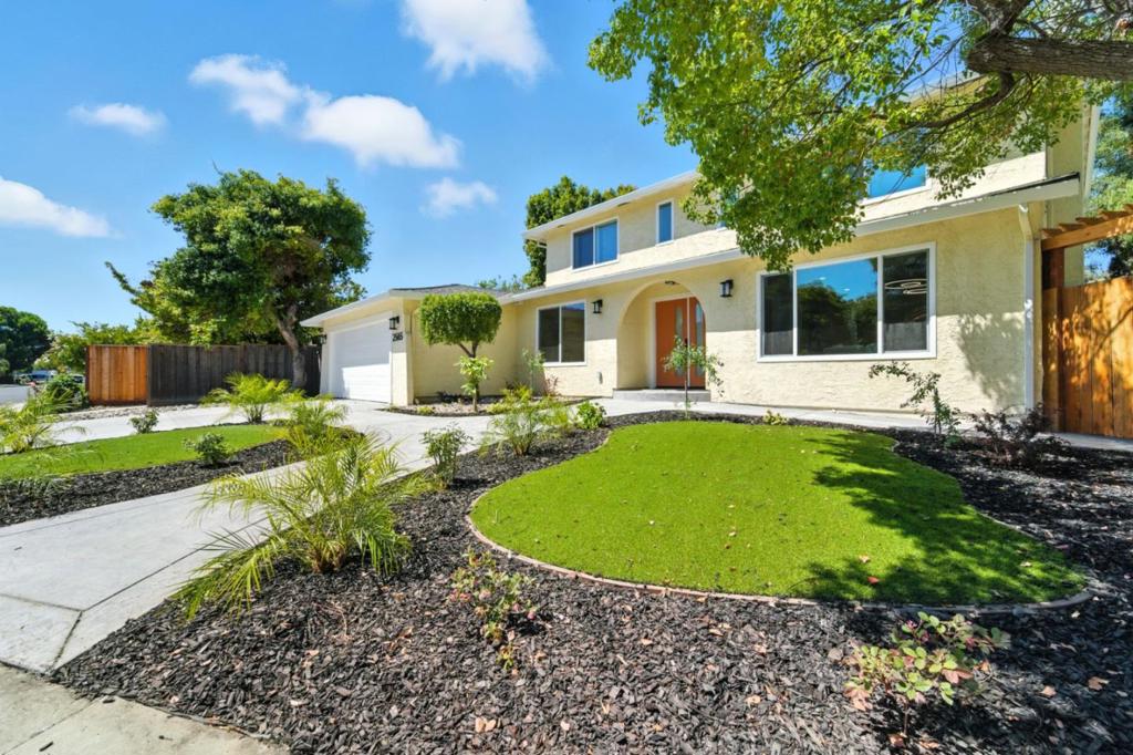***Newly Added High Fences for More Privacy*** Discover the perfect residence in Santa Clara, offering spacious living with 2,449 sqft on a generous 9,506 sqft lot. This home features 5 bedrooms & 3 bathrooms. Ground floor has 1 bedroom & 1 full bathroom. Upstairs bedrooms feature 2 layers of double-pane windows. All 3 bathrooms feature floor-to-ceiling porcelain tiles, luxury amenities from Porcelanosa, stall showers, and showers over tubs. The kitchen is a culinary delight, equipped with quartz countertops, a dishwasher, garbage disposal, hood over range, an electric oven range, and refrigerator. Enjoy meals in the dining area or the eat-in kitchen, which seamlessly connects to the family room with vaulted ceiling. Backyard has serene landscaping along with a working fountain and waterfall feature. Experience comfort with central HVAC, and enjoy the ambiance of a cozy fireplace. The home has energy-efficient features such as ceiling insulation, double-pane windows, Energy Star appliances, and LED lighting. Laundry is a breeze with a utility room featuring electricity and gas hookups, a tub/sink, and a washer/dryer. Additional highlights include a 2-car garage with Level 2 EV hookup, and location within the Campbell Union Elementary School District.