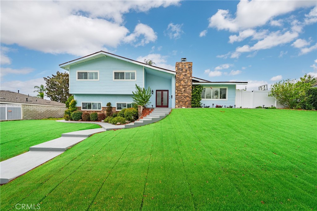 BIG LOT, BIG DREAMS!!!Welcome to this beautifully updated North Upland residence, nestled on a massive 15,141 sqft lot! With 5 bedrooms and 5 bathrooms across 2300+ sqft, this renovated split-level home offers space, style, and versatility for every lifestyle. Enjoy the luxury of two spacious living rooms, a modern chef’s kitchen featuring quartz countertops, stainless steel appliances, and crisp white cabinetry, and fully remodeled bathrooms with designer finishes.
The unique split-level layout provides 3 bedrooms upstairs and 2 bedrooms downstairs, ideal for multigenerational living or potential rental configurations. The formal dining room with vaulted ceilings and fireplace can double as a bonus room or office, and every bedroom enjoys direct bathroom access.
Step outside to an entertainer’s dream backyard: a sparkling gated pool, oversized playground zone, detached garage with ADU potential, and a huge side yard with extra storage unit. The artificial turf front lawn offers impressive curb appeal with minimal maintenance.
With RV/boat parking and over 10,000 sqft of usable outdoor space, this property is a rare gem for investors, families, or anyone dreaming of flexible indoor-outdoor living. Don’t miss this opportunity to own a piece of North Upland real estate!