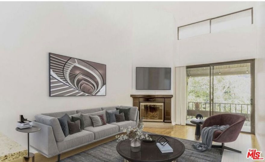 Wonderful top floor corner light & bright unit at Sea Gate Village with high ceilings and a loft that can be either a bonus room or 2nd bedroom overlooking the living room. The living area boasts a fireplace and is open plan for lots of space and has a huge balcony with great tranquil views. Primary bedroom has plenty of closet space. The kitchen has been recently upgraded with stone countertops and steel appliances. Side by side parking close to the elevator add to the comfort and convenience of this corner unit.