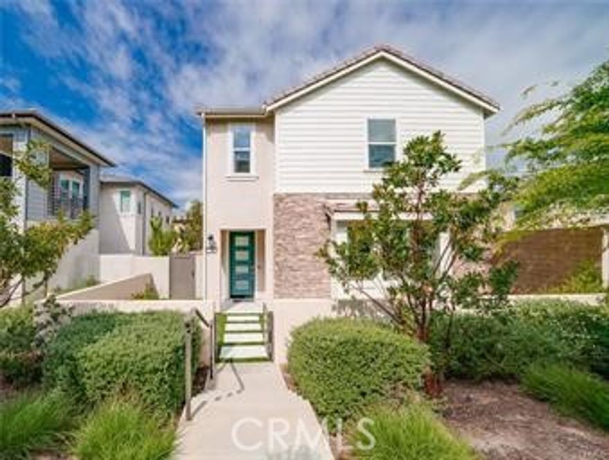 Located in the highly sought-after Irvine Unified School District! This stunning home offers an open-concept floor plan with abundant natural light and thoughtfully upgraded finishes throughout. A spacious upstairs loft provides the perfect area for a home office, playroom, or secondary living space — and the 3-bedroom layout can easily be converted into 4 bedrooms to suit your needs.
Enjoy convenient WALKING DISTANCE to top-rated schools, community clubhouse, and parks.
Step through the private garden gate to a beautifully designed low-maintenance yard with artificial turf and one of the LARGEST BACKYARDS in Great Park. Ideal for entertaining, the outdoor space features a built-in fireplace, tiled patio flooring, and expansive stacking glass doors that create seamless indoor/outdoor living.
Inside, the gourmet kitchen boasts quartz countertops, an oversized island, marble backsplash, GE Monogram appliances, and motorized blinds throughout the home for added privacy and comfort. The main living areas feature upgraded laminate flooring.
The primary suite includes an en-suite bathroom, walk-in closet, and custom built-in storage. Two additional bedrooms also offer custom closets and share easy access to a well-appointed upstairs laundry room with cabinetry.
Additional highlights include:
2-car garage with epoxy flooring and built-in cabinets
Reverse osmosis drinking water system & whole-house water softener
Solar energy system for efficiency
Low-maintenance landscaping
Access to Great Park amenities including resort-style pools, clubhouse, spas, playgrounds, sports parks, and more
Close to Irvine Spectrum, shopping, dining, and major freeways