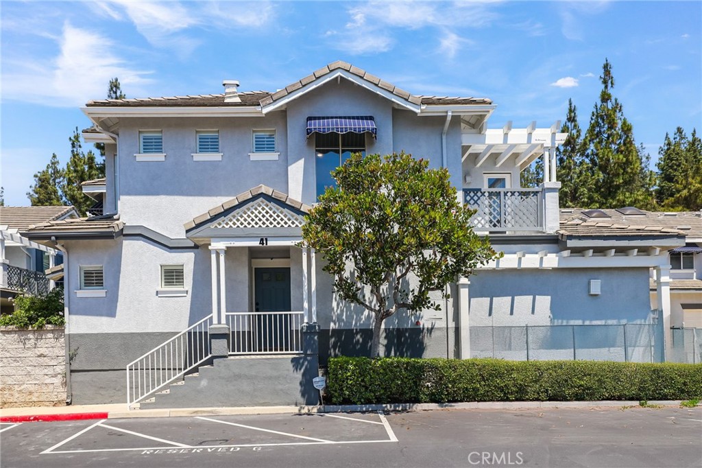 Modern Elegance in the Heart of Aliso Viejo. Welcome to this beautifully renovated 2-bedroom, 2.5 bathroom corner unit in the highly sought-after Coronado community of Aliso Viejo. With plenty of home and a thoughtfully designed living space, this turn-key residence combines upscale finishes with a rare private yard—perfect for relaxing, entertaining, or letting little ones play. Step into a stunning kitchen featuring sleek white shaker cabinets, quartz countertops, subway tile backsplash, stainless steel appliances, and a spacious layout ideal for modern living. The open-concept dining and living area is flooded with natural light, enhanced by recessed lighting and luxury vinyl plank flooring throughout. The primary suite is a true retreat, offering dual vanities, a walk-in glass shower, and private access through elegant arched entryways. The secondary bedroom and bath are equally refined with designer touches. Enjoy the best of Aliso Viejo living—just minutes from award-winning schools, scenic parks, top-tier shopping, dining, and local beaches. This is a rare opportunity to own a stylish, move-in-ready home in one of South Orange County’s most desirable communities. Don't miss out on this fantastic home!