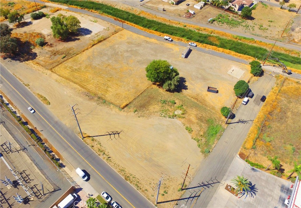 Don't miss out on this incredible opportunity to own prime commercia/ Residential Mixed Use corner lot near the vibrant downtown area of Lake Elsinore. Situated conveniently on the corner of Flint St & Spring St, with easy access to San Diego and Orange County from Ortega highway, this property is over 27,000 (.62 acres). Imagine the possibilities with this usable flat lot, zoned C-1 and strategically positioned on a major busy street to open your business. Assessors Parcel number 374-062-018- Spring Street itself is a well-maintained paved street with curbs and sidewalks, ensuring accessibility and convenience. But that's not all - this land has access to city sewer, electricity, and water lines, making development and utilization a breeze. The unique opportunity to own a commercial lot. Act now to explore this property and make your strongest offer - your future awaits with growth in this area making this one of a kind commercial lot! Hurry before it's gone. Types of C-1 General Commercial business list; Automobile Parts and Supply Stores, Barber and Beauty Shop, Bars and Cocktail Lounges, Department stores, Gasoline Service Station, Ice Cream shop, Laundry and laundromat, Convenience store, liquor stores, mini warehouse structures. The City of Lake Elsinore is being updated and improved- the new City Hall is currently under construction and new Library are two new buildings which will upgrade the downtown area. Please contact the Lake Elsinore City planning department for land usage and your business need and do your own due diligence. Fantastic opportunity to hold or build on this Commercial Lot