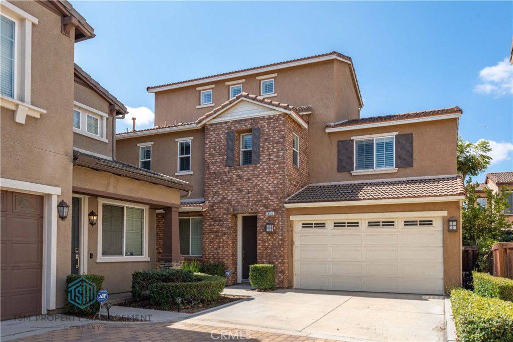 Welcome to this beautiful tri-level home located in the highly sought-after Riverbend community in Orange. Built in 2009, this spacious 3-bedroom, 2.5-bath residence offers 2,441 sq. ft. of thoughtfully designed living space with comfort and functionality in mind.
The main level features a bright and open floor plan with a living room centered around a cozy fireplace, perfect for relaxing or entertaining. The full-size kitchen comes complete with refrigerator, ample cabinetry, and generous counter space for everyday cooking and hosting. A low-maintenance backyard extends your living area outdoors, offering a private retreat with minimal upkeep. Direct access to the 2-car garage adds convenience.
Upstairs on the second level, you’ll find all three bedrooms, including a spacious primary suite, along with a versatile loft ideal for an office or reading nook. The third story features a large open loft—perfect as a media room, game room, or flexible living space.
Community amenities include a resort-style pool and spa, BBQ area, and direct access to Steven Ambriz Memorial Park, complete with a kids’ playground, tennis courts, basketball courts, baseball fields, and scenic open spaces.
Ideally located near shopping, dining, freeways, and top-rated schools, this home offers modern living in a vibrant community setting.