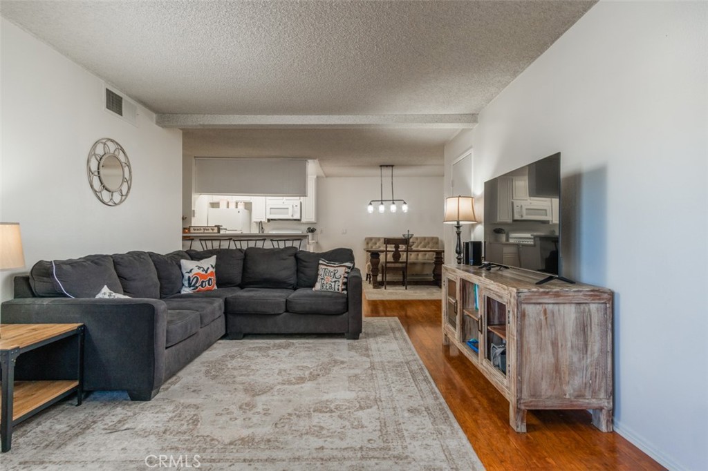 Welcome to Lakeshore living at its finest! This one-bedroom, one-bathroom condo welcomes you into an open-concept living room, dining area, and upgraded kitchen with new countertops, sink, and appliances. Sliding doors lead to a private patio, perfect for morning coffee or evening relaxation. A hallway with ample closet space guides you into the spacious bedroom with even more storage, along with a beautifully remodeled bathroom.
The community offers a covered designated parking space plus ample guest parking, along with resort-style amenities including two pools, spa, tennis court, dog park, kids’ playground, and community laundry. Nestled in a scenic Lakeshore setting with tranquil water features and wildlife, this home is truly a retreat. The HOA includes water, landscaping, trash, and all listed amenities. Please call HOA for rules and more details.
Don’t miss the opportunity — make this beautiful condo yours today!