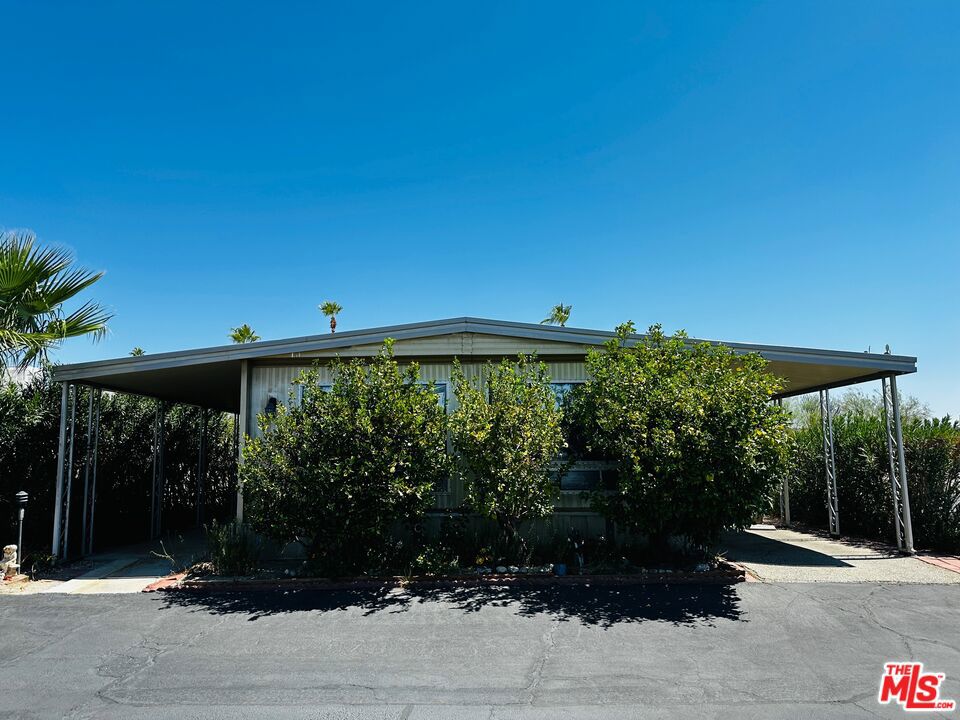 Welcome to Sparkling Waters, Desert Hot Springs' ideal 55+ community, and home to a mineral hot springs pool and spa! Homes seldom come available for sale in this sought-after, quaint community. With 1,440 square foot of living space, this manufactured home comes fully furnished. It features two bedrooms, two baths, a formal dining room with built-ins, a large living room, a family room / den with a wet bar, tons of storage, two utility sheds, central heat & air, washer & dryer, an expansive front patio and a large raised deck with mountain views! You'll appreciate the value-add features, which include a new roof in 2023, a water filtration system, a newer dishwasher, a bidet... the list goes on and on. Situated on a corner lot in a quiet desert community, this one has everything you're looking for - at a price that can't be beat. Schedule your tour today!