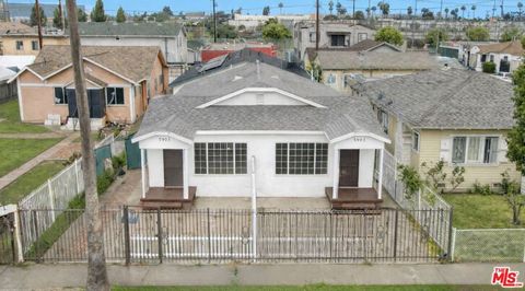 Photo of 5903 Bonsallo Avenue, Los Angeles, CA 90044 (MLS # 26634911)