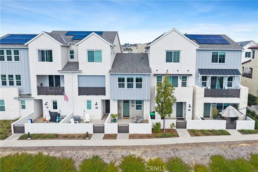 Your Foothills Retreat: Luxury 1-Bed Townhouse with Panoramic Mountain Vistas. A rare opportunity for the discerning buyer: this immaculate 961 sq ft, 1-bedroom, 1.5-bath sanctuary in the desirable Oasis community offers an effortless blend of lock-and-leave luxury and convenience. The home's centerpiece is the Upper Level's open-concept design, anchored by a gourmet kitchen. This space features premium, neutral selections including white shaker cabinets, Carrera quartz countertops, GE Profile stainless steel appliances, and engineered hardwood floors throughout. The spacious Master Suite is also privately situated on this level. The Lower Level is all about flexibility and function, offering a dedicated laundry closet, a powder room, a direct-access attached garage, and a flexible Bonus Room. This room is equipped with a built-in Murphy bed, making it perfect as a guest suite, home office, studio, or gym. Step outside to the oversized front patio to savor stunning, panoramic mountain and valley views that stretch for miles. Immaculate condition means zero work and maximum enjoyment of RMV's celebrated amenities. Enjoy refined resort-style living with access to Rancho Mission Viejo’s premier amenities, including a lagoon-style pool, spa, lap pool, state-of-the-art fitness center, and outdoor movement spaces. Miles of scenic trails, expansive parks, elegant clubhouses, an event barn, and thoughtfully designed social spaces create an elevated lifestyle, complemented by pet-friendly amenities including a dedicated dog park. This is the exclusive, sophisticated, lock-and-leave sanctuary you've been waiting for. Schedule your private showing today.