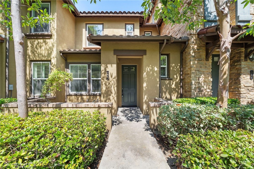 Enjoy this charming 2-story townhome in the tranquil community of Turtle Ridge with 2 primary bedrooms and 2.5 baths. Step inside the cozy living space featuring an open kitchen with breakfast bar, fireplace, direct two-car tandem garage access, and a powder room perfect for guests! Head upstairs to find the ultimate convenience with a built-in desk space, laundry closet, and two primary bedrooms with full bathrooms. Soak up some sun on the front patio perfect for relaxation and entertaining. NO carpet, recessed lighting, and fresh designer paint throughout! Take advantage of beautiful resort-style amenities, nearby hiking trails and sport courts, award winning Irvine Unified schools, and 5-mile proximity to the coveted Crystal Cove beach! Washer, dryer, and refrigerator included.