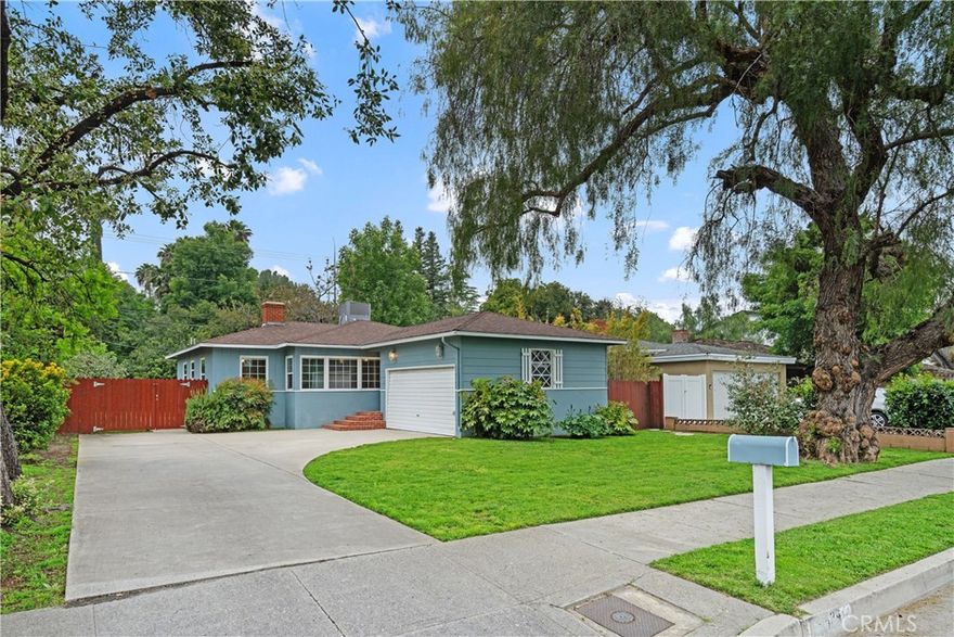 Affordable Woodland Hills single-family house - not ADU.  Classic 3BR 2BA 1164 single story on spacious fenced and gated 7800 sqft tree-shaded lot. Coveted Walnut Acres neighborhood adjacent. Charming 1950's vibe - cozy vintage kitchen with refrigerator, stove, dishwasher and microwave with laundry room with washer dryer.  ALL APPLIANCES INCLUDED! Comfortable family room with fireplace and dining area. Period tile bath plus quarter bath in laundry room.  Newer heat pump AC & heat and double pane windows.  Large garage with room for storage.  Spacious private back yard with covered patio for outdoor living.  Convenient location near public transportation and freeway access.  In a neighborhood of multi-million $ homes, great schools, shopping and dining in Warner Center.  Available 1/2/26