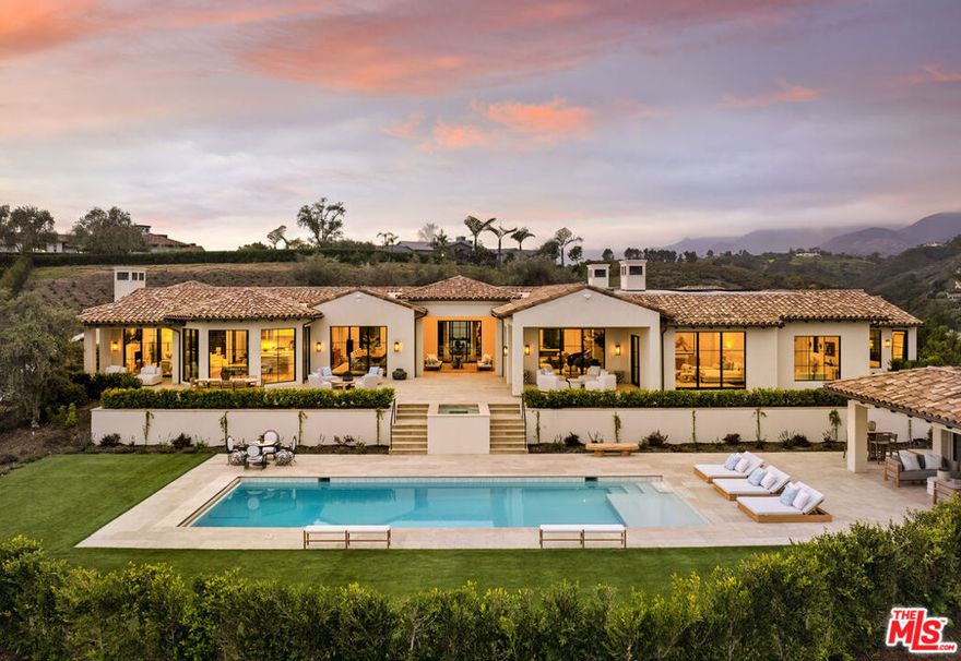 Where Montecito meets the sea, this newly completed 5-acre Mediterranean estate invites you to live the California dream. Located in Montecito Ranch Estates -- a private enclave of just 7 homes w panoramic ocean & mountain views -- the single-level floor plan effortlessly flows btwn refined interiors & expansive outdoor spaces designed for both intimate living and grand entertaining. The residence unfolds across airy living areas featuring a chef's kitchen, 4BD suites, a 2BD ADU & pool cabana, where luxury finishes -- walnut, stone & marble -- elevate everyday living. Outside, a luminous pool, ocean-facing terraces & manicured gardens embrace the sweeping coastline views & natural beauty beyond. Moments from Summerland, the Rosewood Miramar, & Polo Fields, this is the benchmark for luxury living.