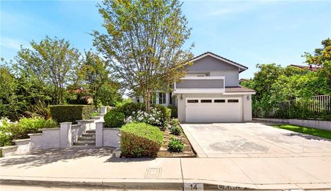 Photo of 14 Rainbow Ridge Rd, Phillips Ranch, CA 91766 (MLS # CV26086024)