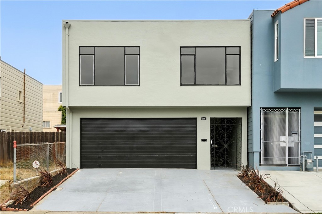 This beautifully updated 3 bed, 2 bath Mid-Century Modern single-family residence with a 2 car garage is turnkey and offers 1,603 sq ft of versatile living space. Situated in a highly desirable location steps away from scenic Marchbank Park it is commuter friendly, just two blocks from BART and minutes to San Francisco, Cinemark Century Theaters and restaurants, Thornton Beach, Lake Merced, golf courses, Westlake, Stonestown and Serramonte shopping centers, and San Francisco State University. The home offers both style and convenience. Upstairs, you'll find 1,160 sq ft of refined living area featuring brand-new luxury vinyl plank flooring and sleek 5.25" baseboards throughout. Freshly painted light gray walls pair elegantly with matte black hardware and contemporary black-framed ceiling light fixtures. The living room is enhanced with new recessed lighting, creating a warm and inviting ambiance. The upstairs bathroom is a showstopper, completely remodeled with quartz countertops, striking marble-finished large format tile shower walls, a matte black framed shower door, LED touch vanity mirror, high-end Hansgrohe designer fixtures, and brand new copper pipes. A new skylight brings in natural light, adding to the spa-like feel. Downstairs offers a spacious 443 sq ft bonus room and a renovated full bathroom with stylish new vanity and LED touch mirror, new black matte framed shower doors— perfect for a home gym, game room, additional two bedrooms, guest suite, or even a potential income-producing studio or ADU. Large two-level backyard includes a lower patio area and a versatile upper level with enough space to build an additional structure or ideal for planting a lawn, vegetable garden, or a play area. The gated entryway welcomes you with Terrazzo stairs, a dramatic large skylight, and brand new front door setting the tone for the stylish design found throughout the home. This property is ideal for multi-generational living, hosting guests, or generating rental income. Don't miss this incredible opportunity to own a move-in ready home in a premier location with unmatched flexibility.