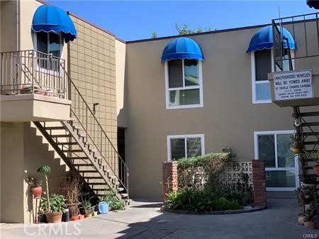 Remodeled two story condo with 2 bedrooms, 1.5 baths, 1000sf (estimated) and small patio. Kitchen with maple wood cabinets, granite and quartz counter top. New ceiling fan in dining area. Upgraded downstairs bathroom with newer faucets in pedestal sink. New recessed LED lights (12). New smooth ceiling and dual pane windows. Wall unit AC in bedroom. New upstairs bathroom has new tub, faucet, new vanity and shower tile. Unit is newly painted. 2 new vinyl fence. 1 carport and 1 open space parking. If you want extra garage, then the fee is $100 per month.
