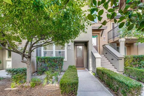 Photo of 589 San Remi Terrace #55, Sunnyvale, CA 94085 (MLS # ML82050776)