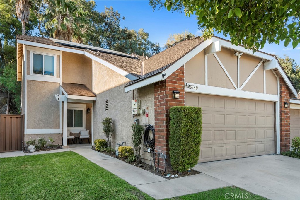 Tastefully upgraded townhouse in the sought after American Beauty Gardens Community. This beautiful home boasts solar, full kitchen remodel, newer flooring and carpeting, backyard pergola, concrete patio, turf and 2 car attached garage! This home features a Full bathroom downstairs and an additional downstairs bonus room which can be used as a playroom, office or even 4th bedroom. The inviting family room features a fireplace and is open to the dining area and kitchen. The upgraded kitchen offers quartz counter tops, custom tile backsplash, stainless steel appliances and plenty of storage. The upstairs offers 3 light and bright bedrooms and 2 full bathrooms. The backyard with no maintenance turf and fully covered patio is a perfect place to entertain while kids and pets play! The community features include pool, spa and tennis court! This is a home you will enjoy for years to come!
