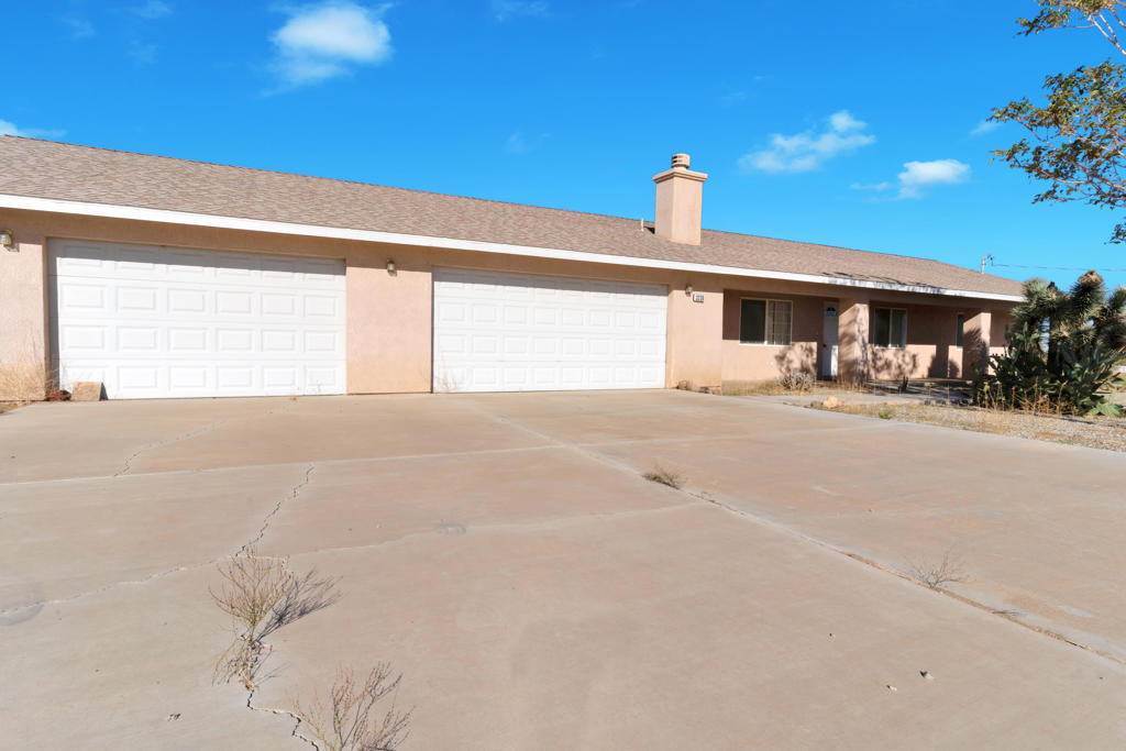 Take a look at this 2 bed 2 bath home with a den that you could convert into a THIRD bedroom. Sprawled out on 3+ acres you have plenty of room for outdoor toys as well. Check out the bar in the backyard while you are here. Come and see this one today!