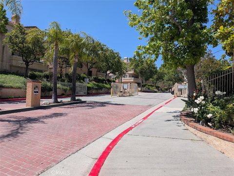 Photo of 19849 Sandpiper Pl #133, Newhall, CA 91321 (MLS # SR26095460)