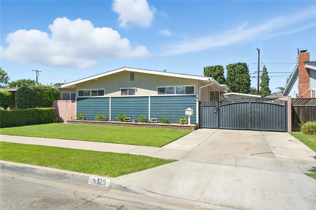 Wow! If you're the entertaining, backyard barbecue type, LOOK NO FURTHER! This lovely and spacious two bedroom is just what you need, with its patio zone and large built-in bar, replete with sink and beertap. Step through the front door of this cutie and enjoy the following features: Open concept living room to dining room and deep kitchen, master suite with walk-in closet, forced heat, deep driveway, enough for several cars, and so much more, you have to see this home to believe it. (NOTE** OWNERS HAVE ALREADY PARTIALLY PACKED FOR MOVING).