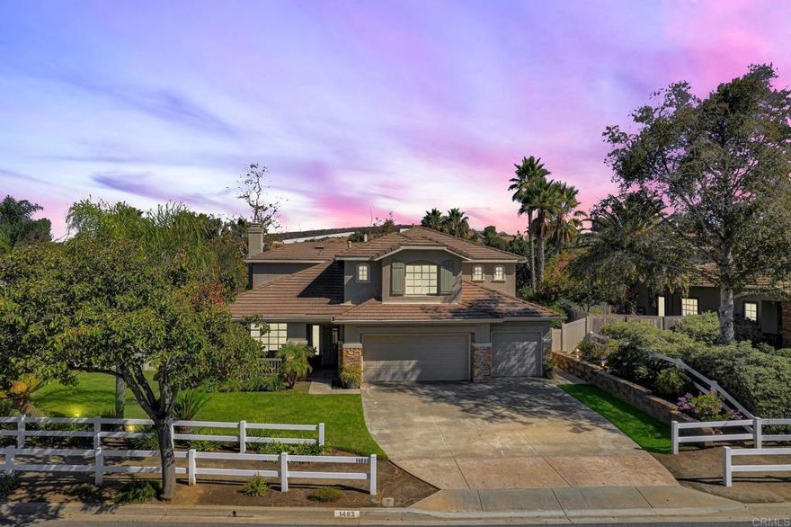 Welcome to this stunning 5-bedroom, 3-bath home offering nearly 3,000 sq. ft. of living space in one of Oceanside’s most desirable neighborhoods. Located in the Marlborough Country Estates enclave of Jeffries Ranch, this home has been beautifully updated and meticulously cared for by the original owners. You are greeted by a charming front porch that opens to a spacious living and dining room with gleaming hardwood floors that flow throughout the downstairs, complemented by custom white window shutters. The inviting family room features a gorgeous updated stone fireplace and a built-in custom entertainment center, located just off the kitchen. The remodeled kitchen offers custom creamy-white cabinetry, dark granite countertops, a large island, and new GE appliances—perfect for family gatherings and entertaining. A cozy breakfast area overlooks the private backyard, creating the ideal space to enjoy your morning coffee.  A conveniently located downstairs bedroom and full bath provide flexibility for guests, multigenerational living, or a home office. Upstairs, the luxurious primary suite features remodeled spa-inspired bath with a separate tub and walk-in shower, two sink areas, and elegant finishes, plus three additional spacious bedrooms. Set on a 0.26-acre lot with no rear neighbors, the property backs to lush natural vegetation, creating a private and tranquil setting. The entertainer’s backyard is a true highlight—complete with an outdoor built-in BBQ, firepit,  manicured lawn, and multiple seating areas ideal for relaxing or hosting guests. Additional features include an oversized three-car garage and close proximity to top-rated schools, shopping, dining, and parks. This rare opportunity combines modern comfort, timeless style, and exceptional outdoor living in the heart of Jeffries Ranch.