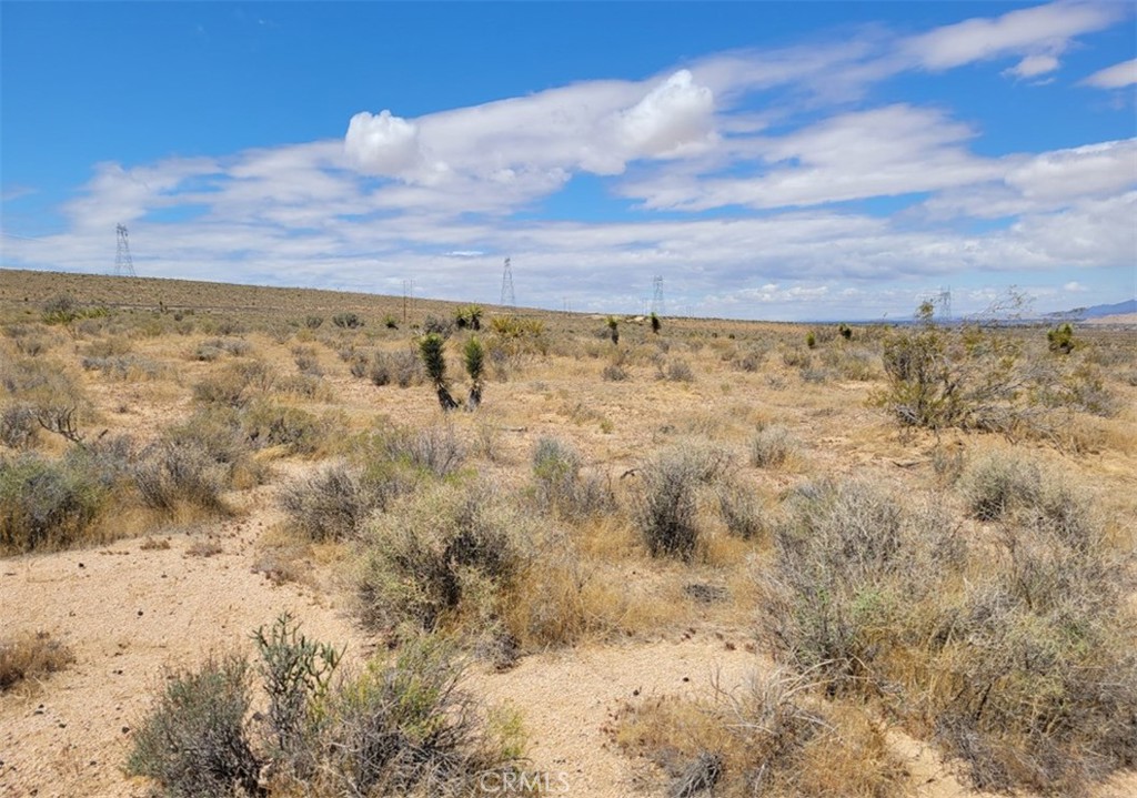 10 Acres (APN: 0435-152-32) GPS: 34.424967, -117.059569 This 10 acres is located in Lucerne Valley, CA within the San Bernardino County. FINANCING AVAILABLE! Owner will finance with $20,000 down, $25,950 First Trust Deed at 8.99% interest for 4 years. Monthly payments are $645.64. This property lies within the unincorporated area of the San Bernardino County within the Lucerne Valley 'Rural Living' (LV-RL) zoning. This Rural Living zone can be subdivided into 2.5 acre parcels. Rural Living allows for Single Family homes, Manufactured homes, accessory crop production, produce stand and agritourism enterprises, animal keeping, livestock operations, school, place of worship, park or playground, Bed & Breakfast and small residential care facilities. Overhead electricity is approx 0.68 miles southeast. Additional 115 KV power lines are approx 440 ft west and 500 KV power lines are approx 1650 ft east. Residents in the area have private water wells, septic tanks and propane tanks for their utility needs. This property does not yet have an address. While the boundary lines on the map offer a glimpse, they are only approximate. A Buyer should verify boundaries, zoning and utilities, ensuring every aspect aligns with their vision for the property. The property does have a dedicated easement along Laramie St but the road has not yet been tractored in.