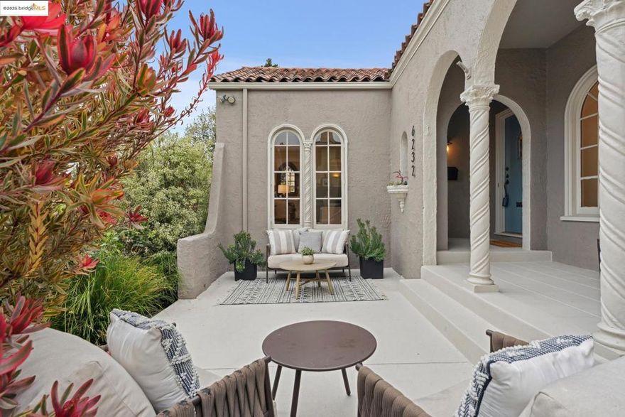 Pristine Mediterranean-style home located on one of Rockridge’s most coveted streets. The main residence features three bedrooms and one full bath, with a convenient half bath located in the third bedroom. The home is complemented by a modern, architect-designed one-bedroom, one-bath ADU. Thoughtfully updated throughout, this home blends timeless character with contemporary comfort. A private courtyard welcomes you with an inviting seating area framed by classic arched windows. Inside, the light-filled living room features floor-to-ceiling windows, a fireplace, and gleaming hardwood floors. The formal dining room carries the same elegant arched detailing, while the galley-style kitchen provides ample cabinetry and space for casual dining. All three bedrooms are conveniently situated on one level.  Outdoors, a lush private garden with mature landscaping creates the perfect backdrop for entertaining or play. Modern amenities include: Solar, air conditioning, dual paned windows, and a tankless water heater. Ideally located just blocks from Chabot Elementary, College Avenue’s renowned restaurants and boutiques, and with effortless access to BART and San Francisco—no car required.