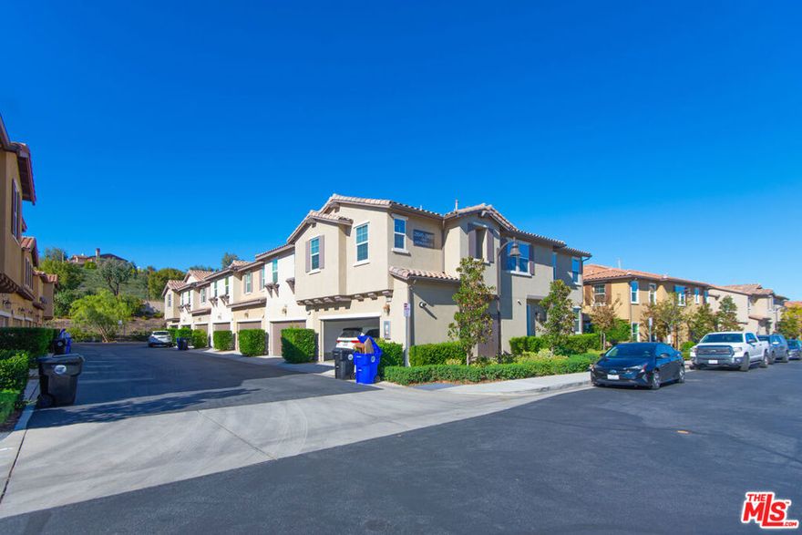 Experience refined Valencia living at this beautifully designed Santa Clarita home. Thoughtful details create an effortless sense of comfort, from the elegant white shaker cabinetry and concrete-gray countertops to the designer-selected kitchen finishes and stainless steel appliances. The serene primary suite offers a spacious walk-in closet, double vanities, and a spa-inspired bath with white cultured marble. Relax or entertain on your private outdoor patio and enjoy the convenience of integrated smart home features. Situated in one of Valencia's most desirable communities, this home provides easy access to scenic trails, premier parks, top-tier healthcare, and upscale shopping and dining at Valencia Town Center and The Patios. A rare opportunity to enjoy style, function, and luxury in the heart of Santa Clarita. Schedule your private showing today.