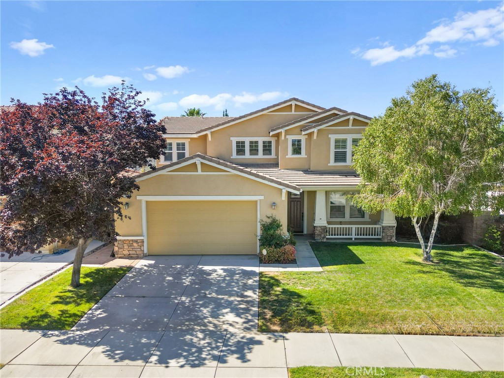 Prime cul-de-sac location within the beautiful Heritage Lake Community, steps from the front door leads directly to the lake and peaceful pavilion. Enjoy the scenic trail around the lake for a morning or evening stroll. Two story home features a bedroom and bathroom downstairs as well as a "den" which can be turned into a formal dining room or formal living room. Property is currently laid out as a 3 bedroom with an upstairs loft currently used as a gaming room with a Jack and Jill bath into the 2nd bedroom. This layout has so much potential, you can customize the space to fit your needs and wants. Open floor plan is perfect for entertaining family and friends, with a huge breakfast bar, custom built-in cabinetry in the living room, and entrance into the well maintained backyard with custom landscaping, and mature citrus trees. Spacious master suite features dual sinks, a soaking tub and a separate shower and a huge walk in closet. Enjoy the Heritage Lake life with a clubhouse, junior Olympic pool, splash pad, a 25-acre lake for catch and release fishing, paddle boarding, and various parks! Conveniently located within walking distance to top-rated schools, easy access to freeways and close to shops, restaurants and entertainment.