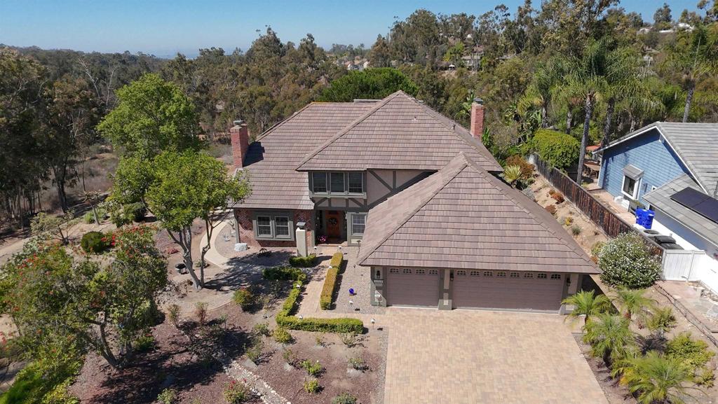 Stunning Scripps Ranch home in sought-after Whispering Ridge on private 1/2 acre lot with breathtaking views. Open layout. Downstairs bedroom and full bath for added ease. Chef’s kitchen with granite counters flows to Dining and Family Rooms. Large Primary suite boasts dual closet and scenic nature views. Central A/C. Three elegant fireplaces. This yard is a nature lover’s dream with professional landscaping throughout. Home comes with paid solar panels and Tesla backup battery. No Mello-Roos fees! Only 1 direct neighbor on 1 side of home. Backyard includes fruit trees, cactus garden, and much more. Community features lots of walking trails and close to top ranked schools. No Mello-Roos! Meticulously maintained home. The community HOA features:Junior Olympic swimming pool, spa, restrooms with outdoor shower, BBQ ‘s, Seating with umbrella and tables, clubhouse, a tennis court & a pickleball court, Children’s Parkset at the end of Spruce Grove. Ready to Move-In!