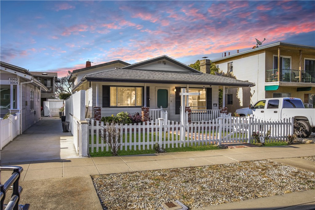 Discover an exceptional investment opportunity at 1054 W 23rd St in the vibrant San Pedro, CA. This captivating four-unit property blends historical elegance with contemporary functionality. It features a charming 2-bedroom/1-bathroom front house complemented by three meticulously renovated 1-bedroom/1-bathroom units at the rear. Recent enhancements, exceeding $150,000, include complete renovation to all rear units, installation of new water heaters and modern appliances, termite tenting completed in May 2023, fresh exterior paint, new vinyl gates, garage door and revamped property drainage system. Strategically situated in an area witnessing a $100 Million Dollar waterfront development - West Harbor, this property is poised for significant appreciation. The development promises to enhance the locale with new entertainment and dining venues, along with breathtaking views of the bustling activities at the country’s largest port. This is a rare chance to be part of San Pedro’s exciting real estate transformation. Seize the opportunity to own a piece of this dynamic community.