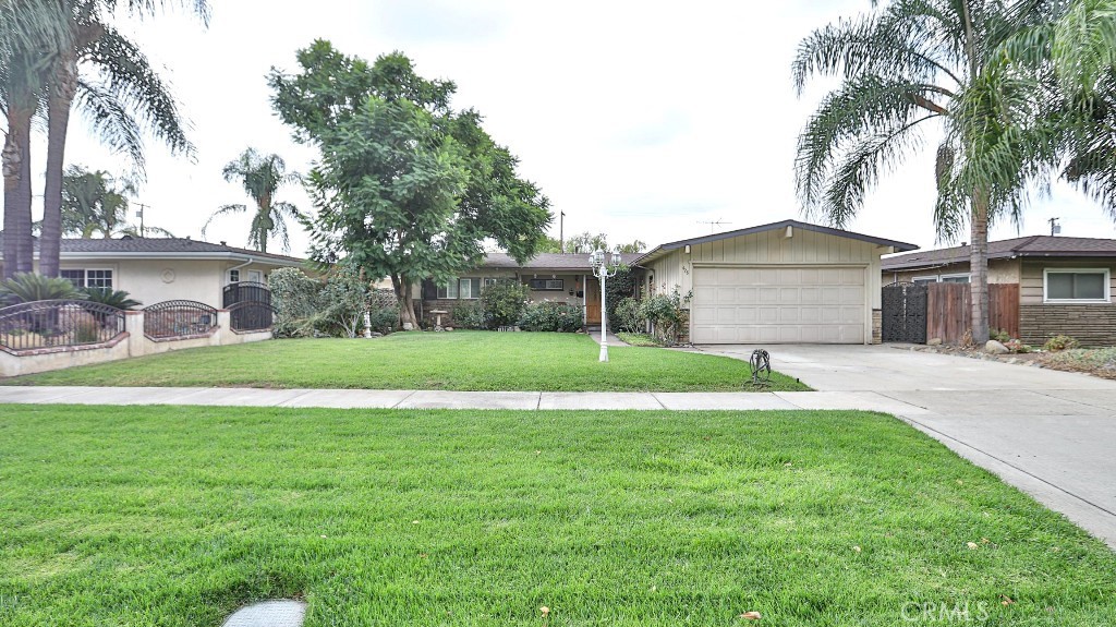 Welcome to this charming single-story home in the highly desirable city of Upland! With 3 bedrooms plus an office that can easily be a 4th bedroom, this home offers a spacious layout with family and living areas flowing into the dining space and kitchen with new appliances, perfect for everyday living.
Step outside to a private backyard with mature fruit trees, and enjoy a park right across the street for family fun or relaxation. This home features a newer roof and a spacious lot, with potential for a future ADU. Located near charming downtown Upland, major freeways, and the scenic San Gabriel Mountains, this home truly combines small-town charm with convenience.