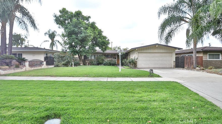 Welcome to this charming single-story home in the highly desirable city of Upland! With 3 bedrooms plus an office that can easily be a 4th bedroom, this home offers a spacious layout with family and living areas flowing into the dining space and kitchen with new appliances, perfect for everyday living. 

Step outside to a private backyard with mature fruit trees, and enjoy a park right across the street for family fun or relaxation. This home features a newer roof and a spacious lot, with potential for a future ADU. Located near charming downtown Upland, major freeways, and the scenic San Gabriel Mountains, this home truly combines small-town charm with convenience.