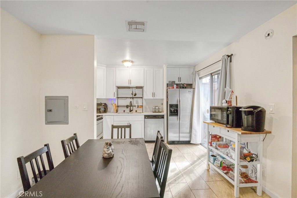 Photo of 7300 Lennox Avenue #J5, Van Nuys, CA 91405 (MLS # RS25250303)