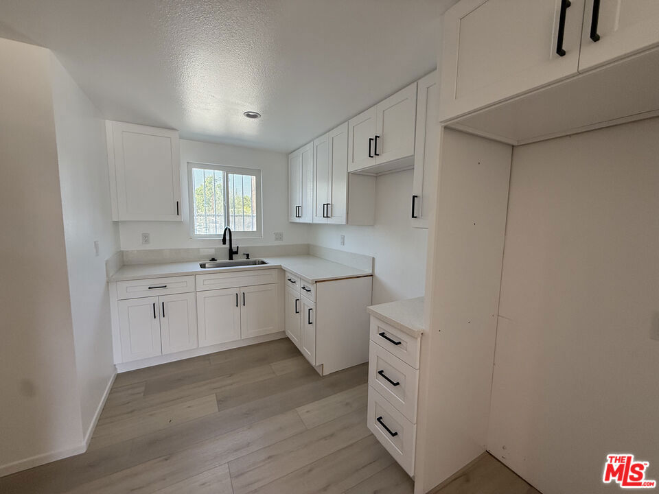 This beautifully updated 3-bedroom, 1-bath apartment combines modern upgrades with everyday convenience. Featuring an open floor plan and abundant natural light, the home has been enhanced with brand-new appliances, doors, and windows throughout. The updated bathroom offers both a shower and a large soaking bathtub perfect for unwinding after a long day. Enjoy two dedicated parking spaces and a fresh, inviting atmosphere that makes this apartment an ideal place to call home.