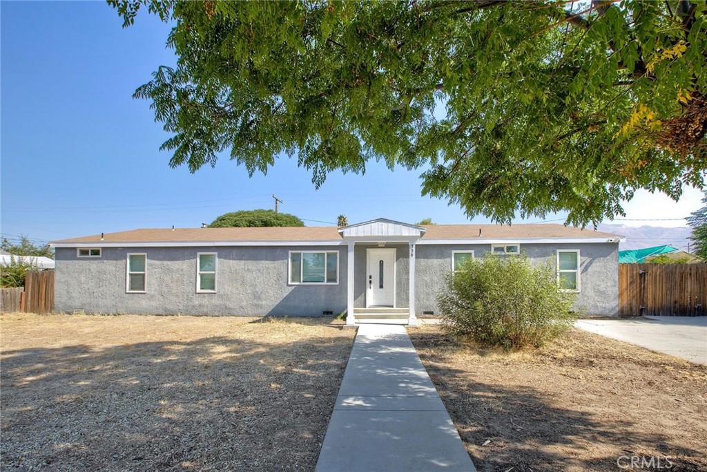 San Jacinto beauty! This fabulous manufactured home is located in a quiet, well maintained Neighborhood. It is truly a gem! Large front yard that is totally fenced in, along with a driveway that will easily fit your RV, toys or even 4 cars for parking. Entertainers Kitchen with upgraded granite counters, stainless sink & appliances, recessed lighting and an island. Super SPACIOUS inside with open layout - featuring an oversized Living room and Bonus Spaces. Perfect for your unlimited uses such as an additional play area, home gym, home office, or ???
Separate laundry room with tankless water heater. Nice laminate floors, vaulted ceiling, Water treatment system, water softening system, ceiling fans, recessed lighting, upgrades everywhere. Look at the huge dining area – enough for large family gatherings.
The Primary Bedroom has 2 Walk In Closets while it’s bathroom has a stunning walk-in shower. 3 other large bedrooms and another walk-in shower. Oversized backyard with 2 car garage, an additional storage shed and room to add ????. Huge outdoor covered patio. Another RV can be parked here in the back. All behind a private wood fence. This lot is almost 1/3 or an acre, ready to be customized by you. With ultra low taxes and no HOA, you don't want to miss this one! It's a beautiful home! With its 4 Bedrooms, it's uniquely large for the area. If you're seeking value for your money, you've found it! This is the one!