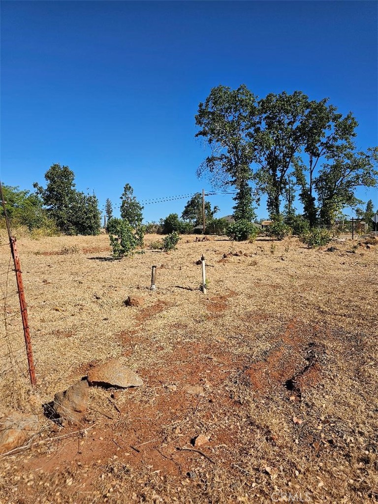 Very nice lot, This is a corner lot with some really nice views. Water is being paid and septic is unknow. It is close to school bus stop, and 10 minutes fron town.