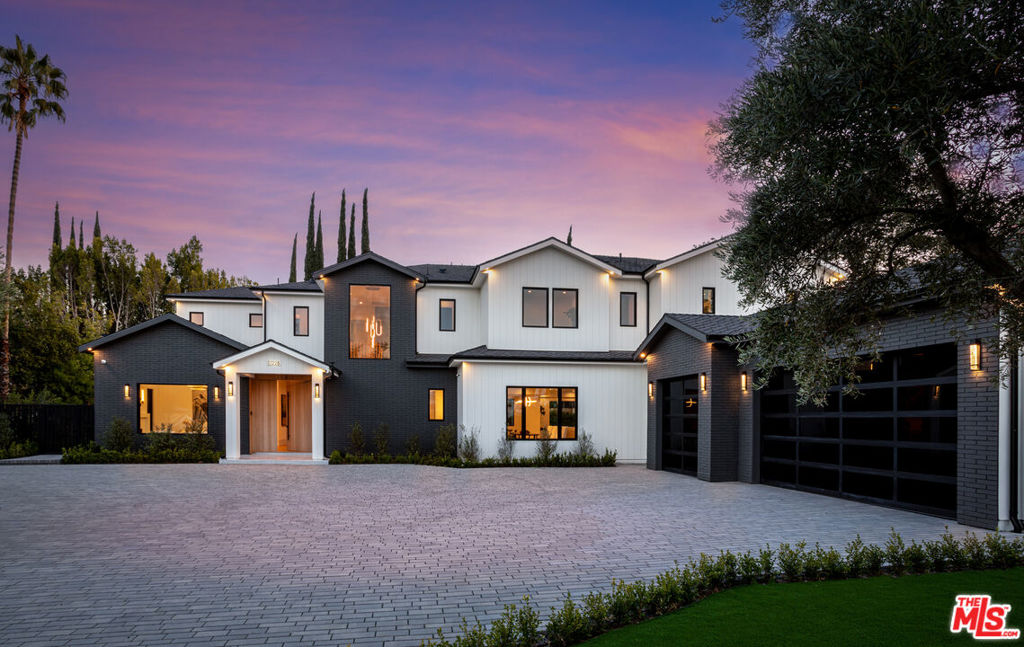 Gated. Grand. Impeccably designed for the discerning family. This is a home built with intention. At the end of a quiet cul-de-sac, this newly constructed modern estate isn't merely a house, it's a love letter to the life you've been waiting to live. Surrounded by perimeter surveillance, this house offers the rare combination of elegance, safety, and seclusion. This is where opulence meets family-first design, a place where children can safely ride bikes, shoot hoops, or splash in the pool, all within the security and serenity of your private estate. The state-of-the art kitchen, with its marble, muted tones, and butler's pantry perfectly marries form and function for gourmet meals or casual family gatherings. The kind of home where light dances across pristine white oak floors, showcasing the craftsmanship which adds architectural warmth to the expansive living spaces. There are six generously scaled bedrooms. There are seven full bathrooms, two powder bathrooms, and yes, heated floors in most. Because even luxury can be nurturing. A bank-grade safe room and a three-car garage ensure total peace of mind, blending luxury with practical security. Downstairs, the entertainment-rich basement is every teenager's dream (and every parent's bargaining chip); offering a sleek bar, fantastic media room, and a gym. Outside, enjoy the epitome of the California lifestyle as the crystalline pool glistens, the guest house charms, and the basketball court pulses with the sound of childhood. There are security cameras all around, but because peace of mind is the ultimate luxury. Amestoy Estates's crown jewel, this retreat isn't just a luxury home it's a lifestyle and a promise of extraordinary living.