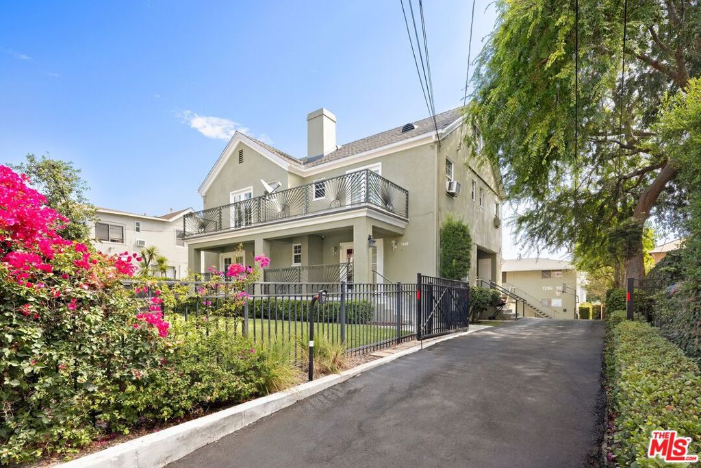 Set on an oversized lot in a quiet Pasadena neighborhood, 1400 N. Garfield is a fourplex that combines scale, flexibility, and clear upside. With unit layouts that feel more like individual homes, this property is well-positioned for an owner-user or an investor looking to capture strong in-place income with additional potential. The large parcel offers both privacy and functionality, and provides an ADU opportunity (buyer to verify), offering future ownership a valuable path to increased density. The unit mix is ideal for Pasadena's tenant base, offering sizes and layouts that appeal to growing families and young professionals alike. The front building includes a 2-bdrm, 2-bath + loft unit of approx. 1,500 SF and a 4-bdrm, 2.5-bath unit of approx. 1,677 SF, each with fireplaces, French doors, and classic architectural details. In the rear, two matching 3-bdrm, 2-bath units provide further scale, with the upper unit featuring a private deck and the lower unit opening to a full-length patio. Recent upgrades, including new roofs, copper plumbing, a resurfaced driveway, earthquake retrofit, fresh exterior paint, and landscaping, give the property stability and ease of management. Property amenities include a 1-car garage with in-unit laundry for the front units, surface parking between the 2 buildings, covered carport parking, and community laundry for the rear units. The location adds another layer of strength. Tenants are within minutes of Old Town Pasadena, the Rose Bowl, neighborhood retail along Washington and Lake, and major job centers throughout the San Gabriel Valley. Pasadena's consistent rental demand, paired with the property's scale and lot size, makes 1400 N. Garfield is a compelling opportunity for both investors and owner-users.
