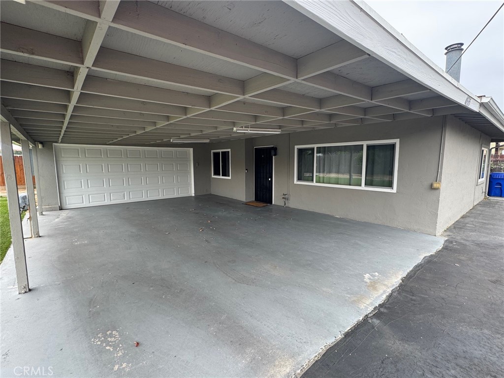 Charming 1,229 square feet, 3-bedroom, 2 bathroom home for Lease in Santee, conveniently located less than a mile from the 52 freeway. Home has a private easement (Gienke Lane) as a driveway for access and is commonly referred to as a flag lot. This updated private single-story home offers energy-efficient windows, fresh paint, newer vinyl plank flooring, and brand new carpet. The family room includes a wood-burning fireplace and opens to the dining area, perfect for everyday living. The kitchen is equipped with granite countertops, stainless steel appliances, a gas range, and modern cabinetry. The primary bedroom includes a private bath and ceiling fan, while the two additional bedrooms also offer ceiling fans and share an updated hallway bathroom. Enjoy the large backyard with a covered patio/carport and artificial turf. Indoor laundry. 2 car garage. Clothing washer and dryer and refrigerator included.