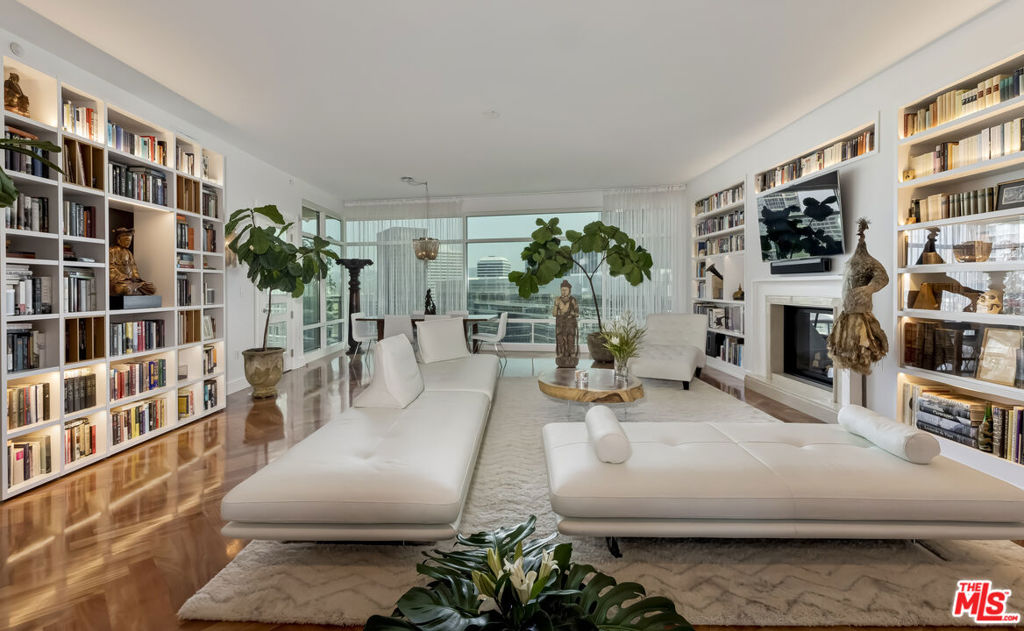 Welcome to Unit 17C at The Century, one of Los Angeles' most distinguished and sought-after full-service high-rise buildings. This stunning 3-bedroom, 4-bathroom residence offers expansive northeast-facing views of Century City, Beverly Hills, and Bel Air, making it a true standout. Upon entering, you're greeted by a spacious entry foyer that flows seamlessly into an open living area, where floor-to-ceiling windows capture the true essence of natural lighting during the day and the city lights at night. The gourmet kitchen features high-end appliances such as a Sub-Zero refrigerator, Viking oven and stove as well as sliding doors that open to your own private balcony. The spacious primary suite encompasses the entire East wing of the unit; it includes a balcony, walk-in closet and a beautifully designed primary bath with his & her sinks, walk-in shower and bath. The West wing houses two additional bedrooms, each with its own en-suite bathroom, along with a private laundry room for added convenience. Custom-designed and truly one of a kind, the unit offers exceptional storage with nine closets, including pantry, linen, coat, and two walk-in closets, maximizing the 3,280 sq. ft. of interior space. Additional features include a private concierge closet on the floor and a separate storage unit in the building. Designed by acclaimed architect Robert A.M. Stern, The Century sits on four beautifully landscaped acres and offers an unmatched array of 5-star amenities. Residents enjoy a state-of-the-art fitness center with private spa treatment rooms, a resort-style 75-foot lap pool with cabanas, a wine storage room, screening room, business center, children's playroom, private dining room, dog park, and exclusive on-site dining at Hinoki & The Bird. With 24-hour gated security, concierge service, and valet, The Century defines luxury, safety, and convenience.