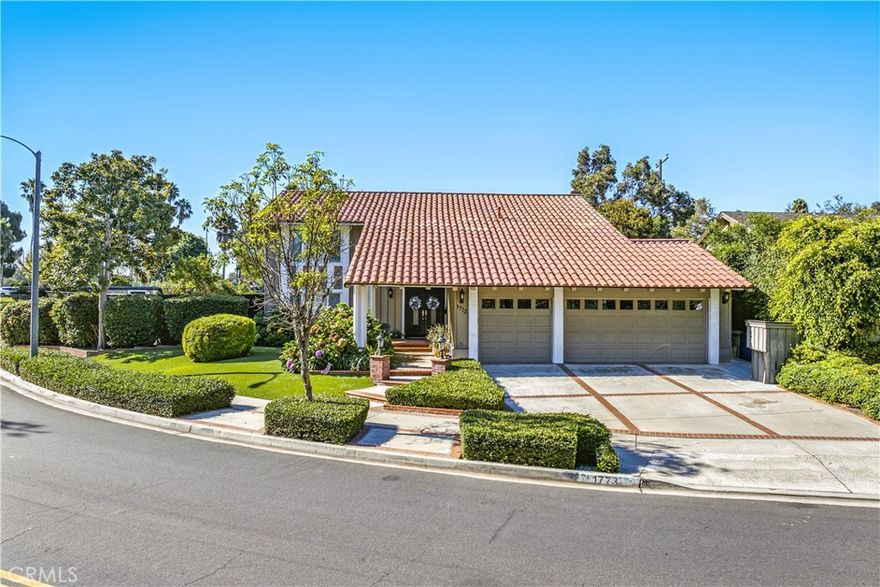 PREMIERE LOCATION in the highly sought after "UPPER BIRDS" Tract Of MESA VERDE!! This quality built home sits on a highly desirable corner lot and is conveniently located directly across from Tanager Park and within steps to the Costa Mesa Golf Course which features 2-18 hole courses. There are four bedrooms two full baths upstairs one with two separate sinks and a half bath down. This spacious home offers the following interior features: Travertine flooring in the entry way, kitchen, family room and laundry room with tile flooring in the bathrooms and wood flooring on the stairs and three of the bedrooms with bamboo flooring in the 3rd bedroom which also has a golf course view. Recessed lighting and a large walk-in pantry in the kitchen, a formal dining room with french doors and a large family room with a fireplace and french doors to the outside. A large master bedroom with a full bath and his and hers double closets. Crown molding and plantation shutters. Exterior features include: mature landscaping front and back with professionally installed artificial turf for easy care, mature lemon tree which is on a drip system along with plants, two large storage areas one with electricity that can be a workshop or great space for a hobby and a louvered door from the garage to the back yard for convenience.