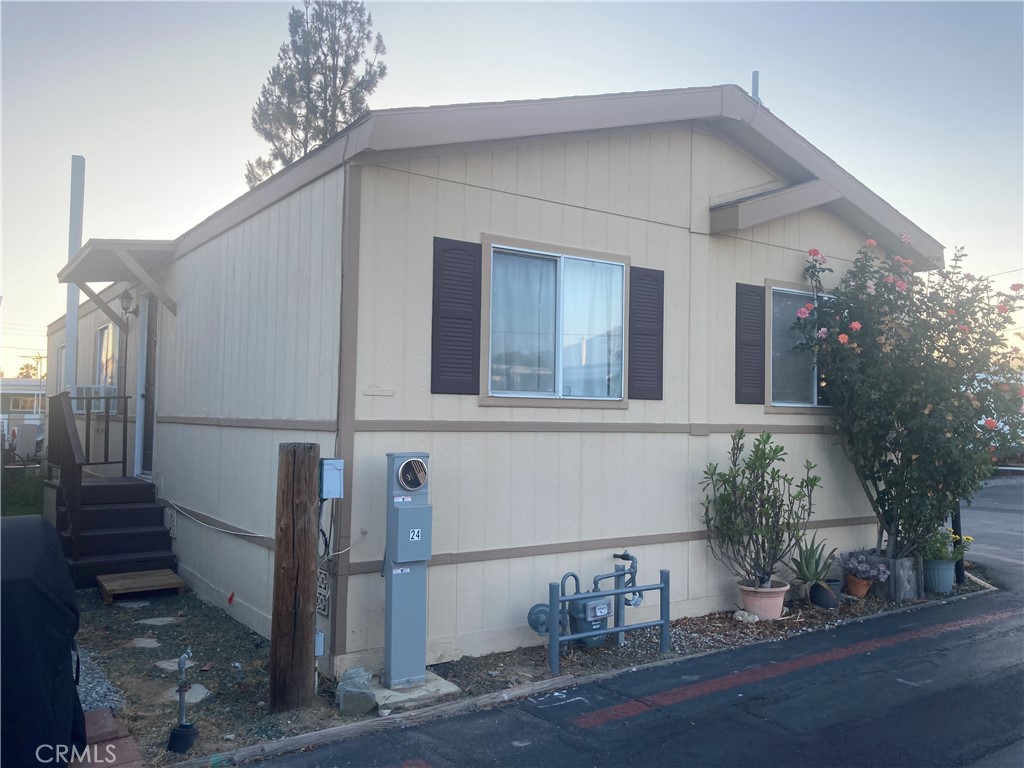 lowest rent in the area at $679.43 (Base rent) Mobile Home in a family park with pool and club house. Built in 1999 Three bedrooms with Two full bathrooms. Prime location, close distance to other counties (LA, Orange, San Bernardino and Riverside). Well maintained the property by the owner.