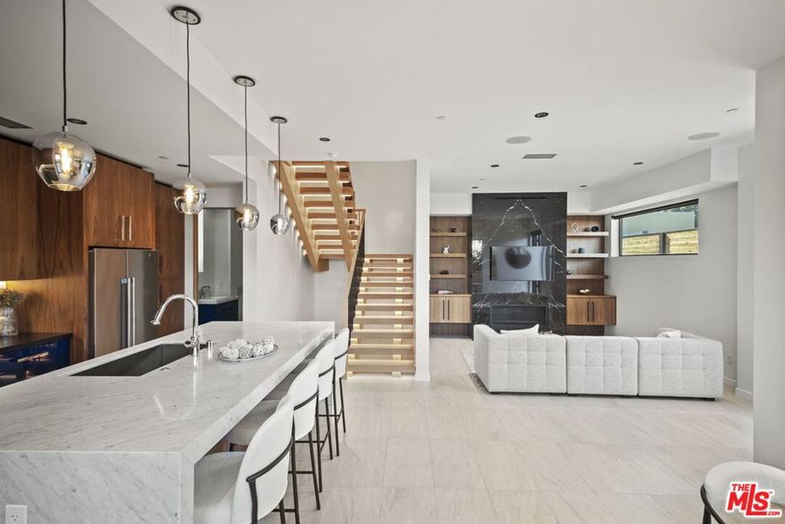 Brand new beachside unit with an amazing location close to all Santa Monica has to offer. The 2,000 sq. ft. space features high end finishes, style and comfort. With only three units in this stylish gated compound, you will find privacy and relaxation. This end unit offers tremendous natural light on all levels and expansive private terraces and a rooftop deck with views and ocean breezes. The two luxurious bedrooms each offer ensuite bathrooms and plenty of closet space. The open living area leads to a thoughtfully designed chef's kitchen with high end appliances. Additional items include 2 car underground parking, with an option to purchase a third, rooftop wet bar, and side by side washer and dryer. Come see why this is one of Santa Monica's best locations. More photos to come.