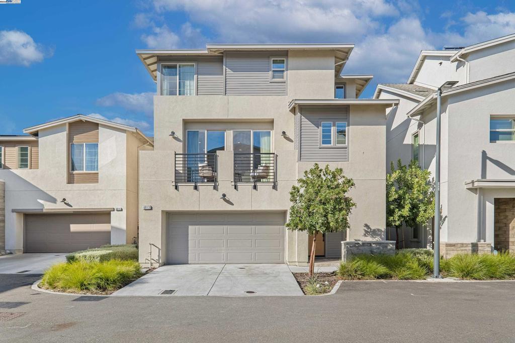 Built in 2022 and showcasing an array of designer-selected upgrades, this stunning detached home offers the perfect blend of modern comfort, style, and functionality in the highly desirable Boulevard master-planned community of Dublin. Boasting 4 bedrooms, 3.5 bathrooms, and a private driveway, this home is thoughtfully designed for today’s lifestyle. Nestled on a quiet court, it features a bedroom suite with a full bath on the first floor—ideal for guests, extended family, or a home office. The suite opens to a private outdoor room and yard, perfect for morning coffee or evening gatherings. Upstairs, the open-concept second floor shines with a spacious great room, bright dining area, and large deck ideal for indoor-outdoor living. The chef-inspired kitchen features sleek cabinetry, premium countertops, and high-end finishes throughout, creating an inviting space for both everyday living and entertaining. Retreat to the upper level, where the luxurious primary suite offers comfort and privacy, complemented by additional well-appointed bedrooms and bathrooms. Enjoy the benefits of fully owned solar panels and a whole-home water softener system, ensuring both sustainability and convenience. Residents enjoy premium community amenities, including a gym, pool, clubhouse, parks.