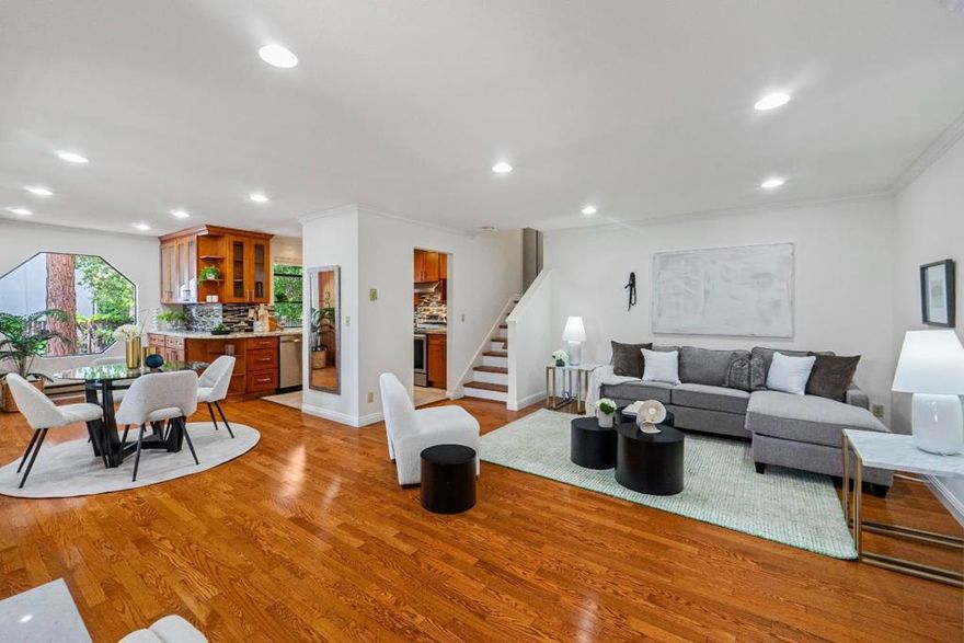 Welcome to this quiet, recently remodeled condo with highly desirable Cupertino Schools! Ground floor end-unit 2b/2b has a fenced front yard. New interior paint. Very bright with more windows and features an open floor plan with living room, dining area and kitchen smoothly connected. Kitchen has granite countertop with solid hardwood cabinets and newer appliances. Crown molding on the ceiling with lots of recessed lights. Spacious master bedroom includes a walk-in closet and double sink vanities with granite top. The condo features an in-house laundry room with a lot of wall cabinets, offering ample storage space. Additionally, the two-car oversized garage downstairs is equipped with full-wall built-in cabinets, providing extra storage options. Minutes to Google, Meta, LinkedIn, Apple Park and all other High-Tech companies. HOA covers all the Building Exterior, Hot/Cold Water and Garbage. Come, See and Make it yours!