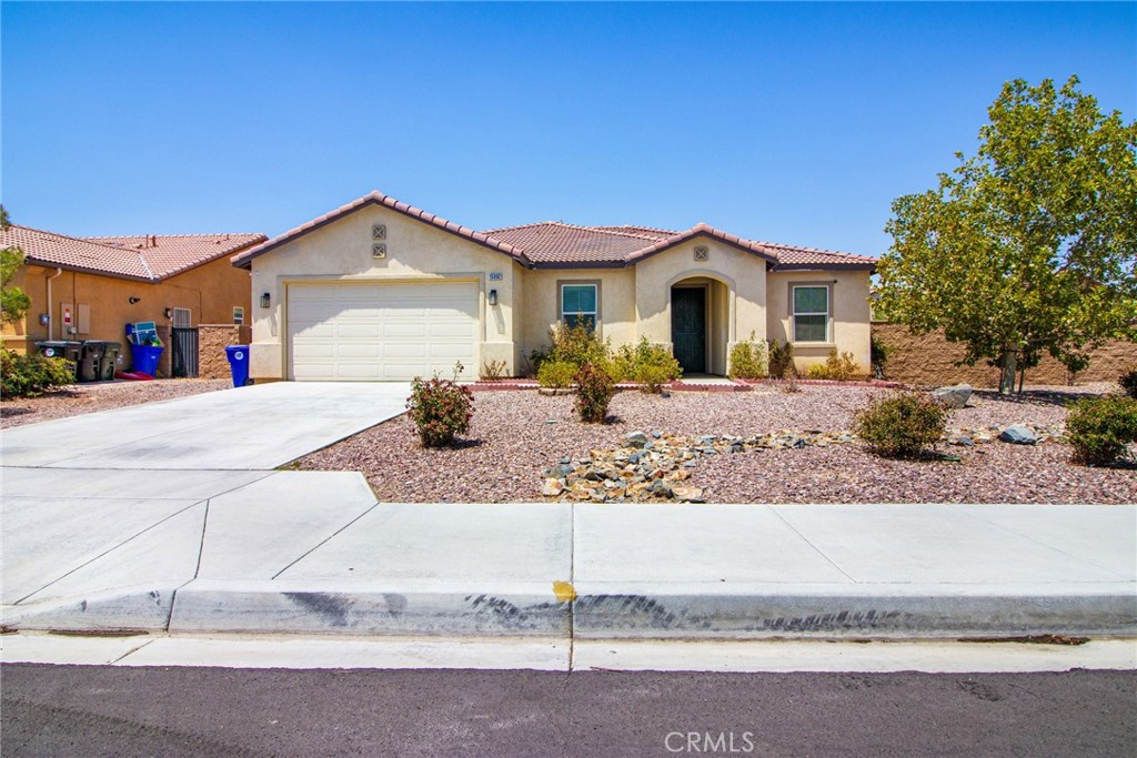 LOCATION, LOCATION, LOCATION!
Welcome to this beautifully maintained single-story home offering just under 2,500 sq. ft., 4 bedrooms plus an office, and 3 bathrooms, perfectly situated on a spacious corner lot in one of Victorville’s most desirable, commuter-friendly areas.
From the moment you walk in, you’re welcomed by an open-concept layout filled with natural light and vinyl tile flooring flowing throughout the main living areas. The living room and dining area open seamlessly to the kitchen, which features granite countertops, stainless steel appliances, a breakfast bar, and abundant cabinetry for all your storage needs.
The primary suite offers a private retreat with a walk-in closet, spa-like tub, walk-in shower, and dual sinks with plenty of cabinet space. Three additional large bedrooms, a dedicated office, a full bathroom, a half bath, and a laundry room with shelving make this home as functional as it is beautiful.
Outside, the backyard is perfect for entertaining with a covered patio, concrete slab for BBQs, a kids’ play area, and a gated dog run. The corner lot location and full block wall provide added privacy and curb appeal.
This one won’t last—schedule your private showing today!